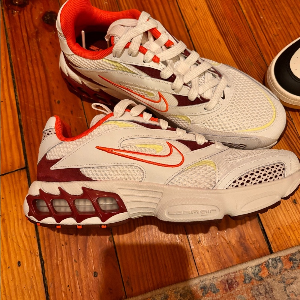 Nike Zoom womans White and Orange Sneakers